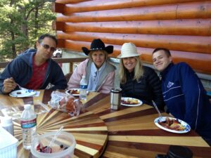 FR CO members enjoying the great outdoors on patio deck.  There is also a rooftop deck with 360 degree view of forests and mountains.