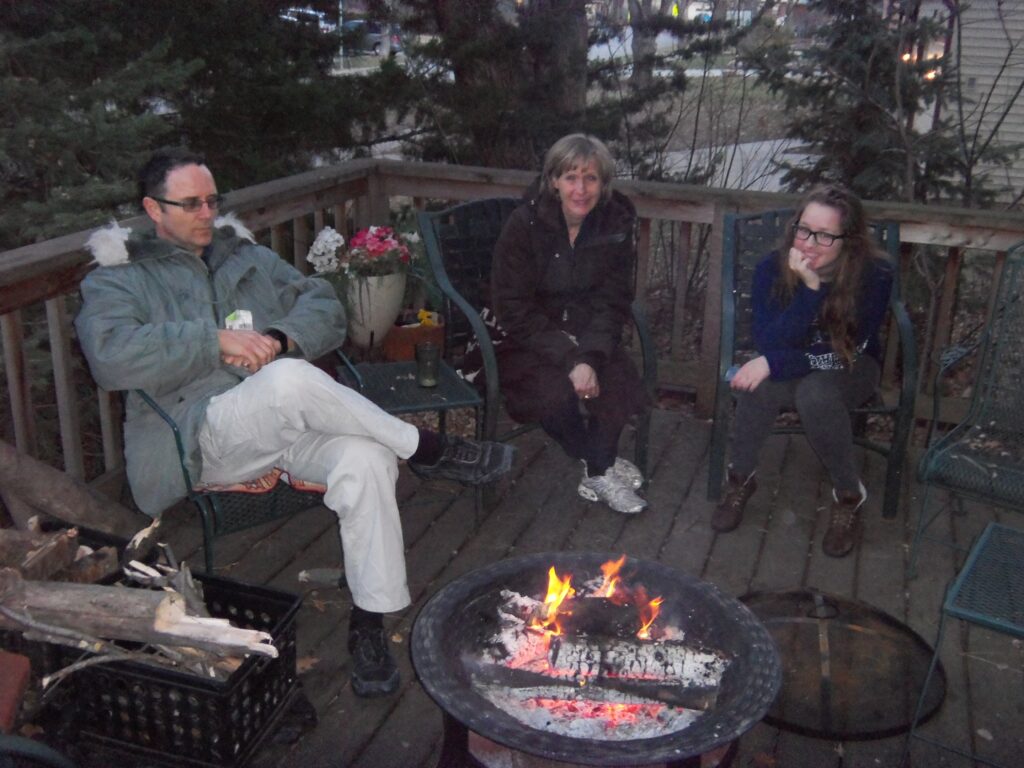 Members enjoying a campfire