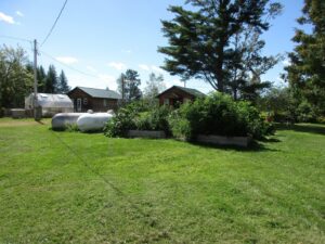 We have a propane generator as well as solar and grid power, a greenhouse, and garden in the summer.